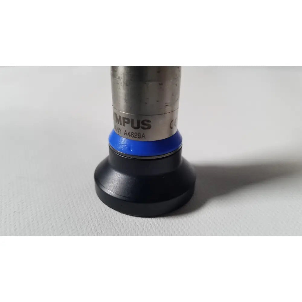 Silver metallic olympus a4629a hd laparoscope 4mm 30 degree with black rubber base and blue ring for medical use