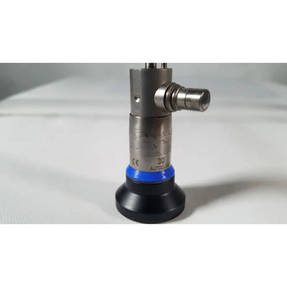 Silver metallic olympus a4629a hd laparoscope 4mm 30 degree with blue ring and black base featuring engraved markings