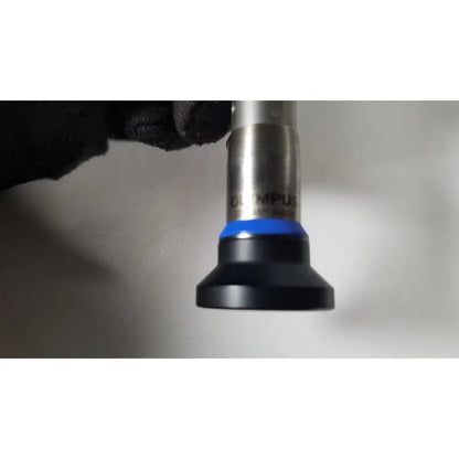 Olympus a4629a hd laparoscope end cap with black and blue accents on a metallic shaft for autoclave resectoscope use