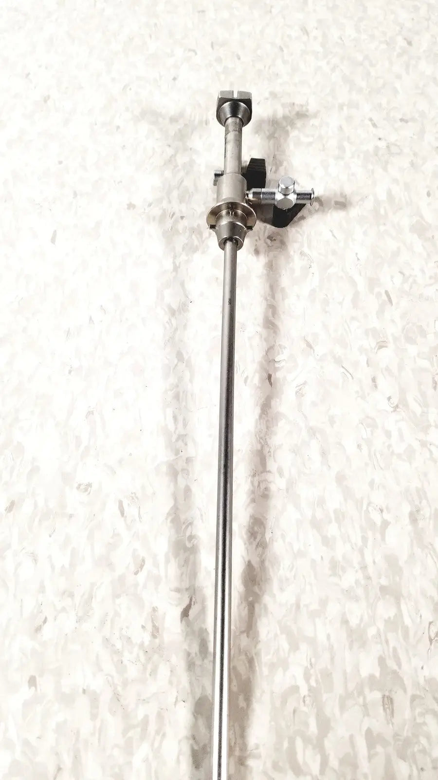 Sleek metallic olympus a4764 hysteroscopy sheath 7fr with long slender shaft and articulated multi-joint head