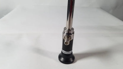 Black and silver olympus a5254 10mm laparoscope with a sleek cylindrical design for precise surgical procedures
