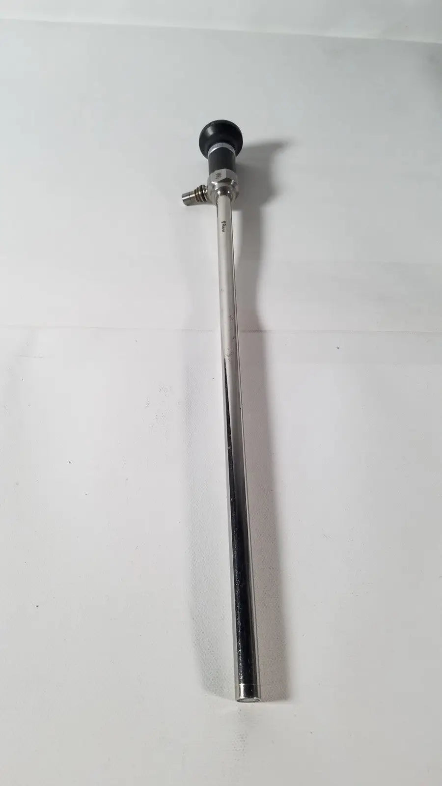 Silver surgical laryngoscope with black spherical handle and metallic joints for olympus a5254 10mm laparoscope use