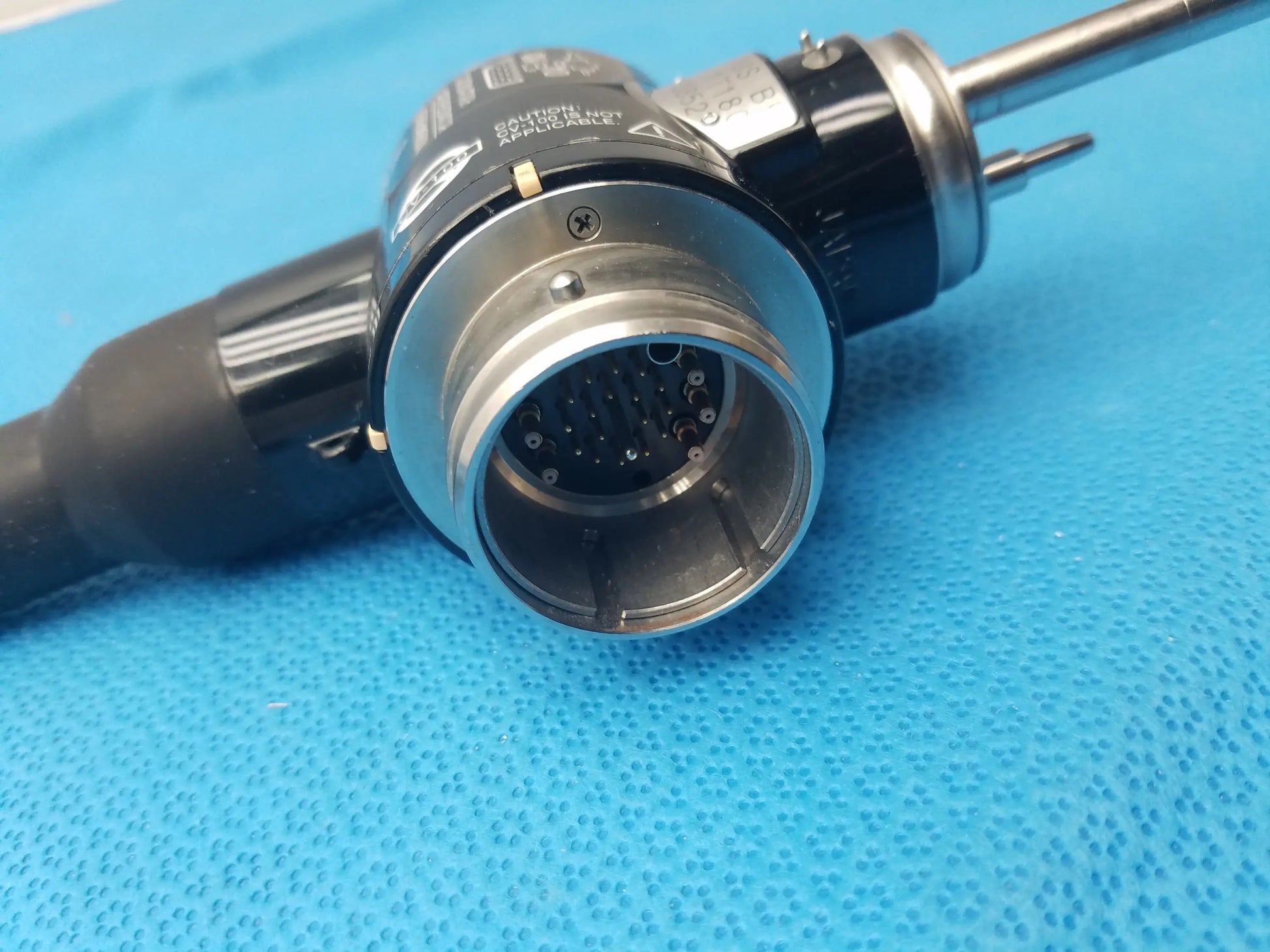 Black and silver Olympus Evis Exera type 1t180 medical endoscope with metallic connector housing for gastroscopy