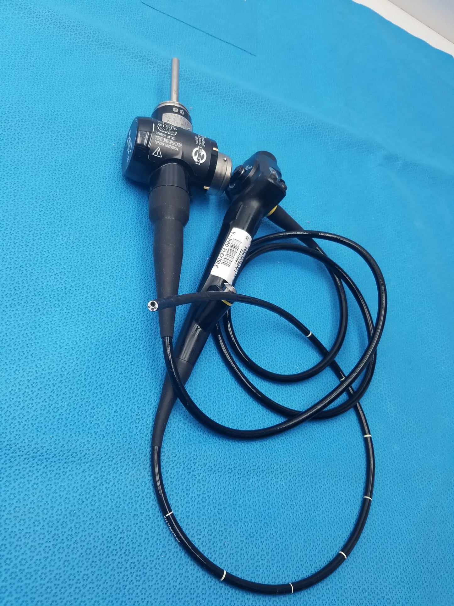 Black olympus evis exera type 1t180 video gastroscope with coiled cable and metallic tip for medical use