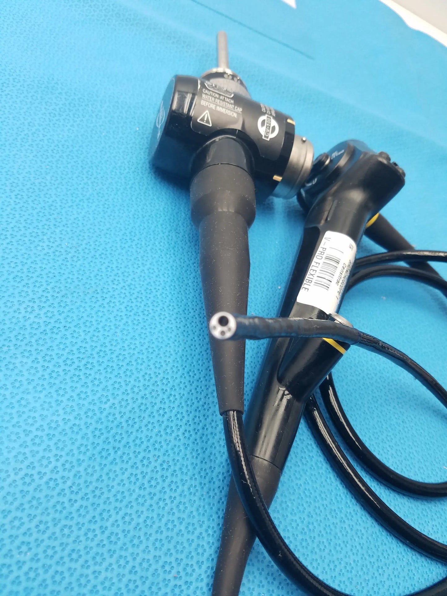 Black olympus evis exera type 1t180 video gastroscope with ergonomic design and coiled cables for medical use