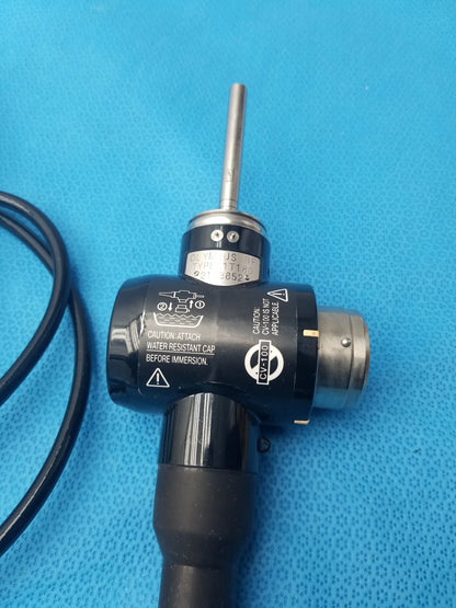 Black Olympus Evis Exera II type 1T180 gastroscope with metallic tip and silver labeling in serial number 2143852
