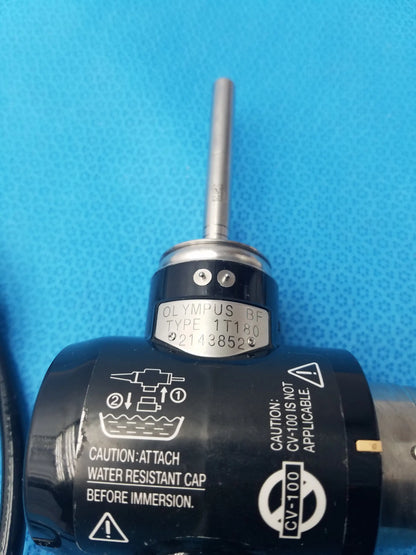 Black olympus bf type 1t180 evis exera video gastroscope lens mount with silver metallic tip and engraved serial number