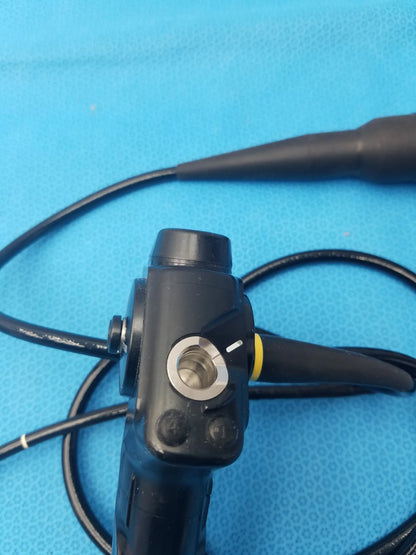 Black Olympus Evis Exera II video gastroscope type 1T180 with circular lens port and yellow handle accent