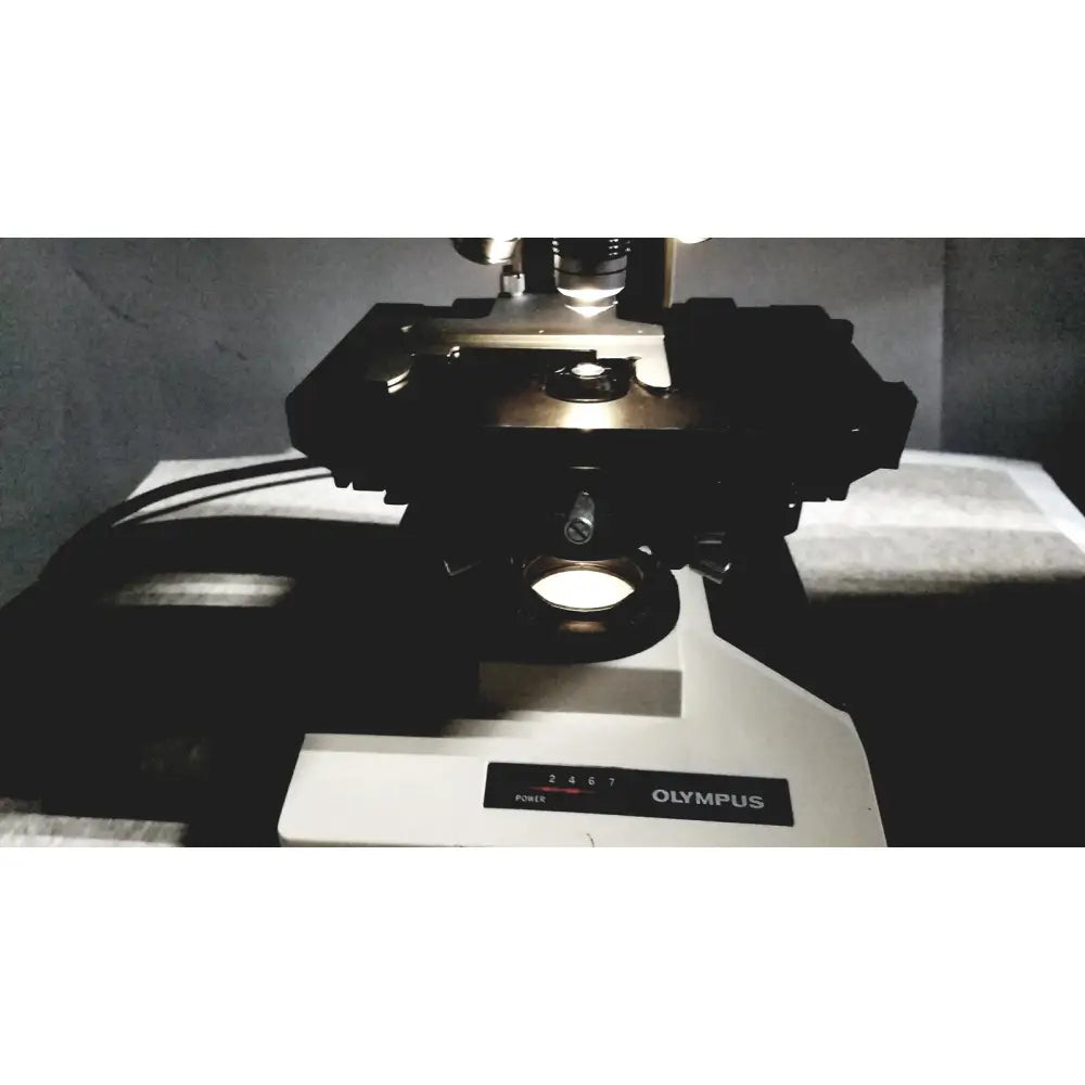 Black and white olympus bh-2 binocular microscope with metallic components for professional laboratory use