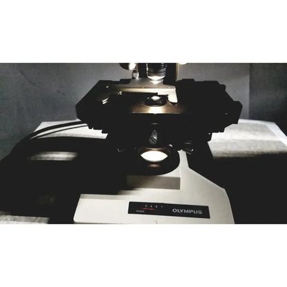 Black and white olympus bh-2 binocular microscope with metallic components for professional laboratory use