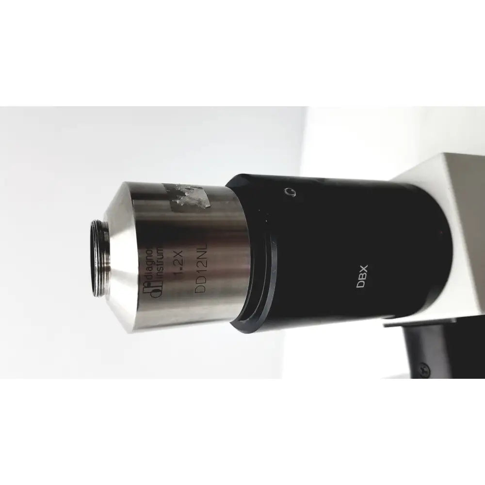 Black and silver microscope objective lens with engraved markings and metallic finish for olympus bx51tf microscope with some body damage