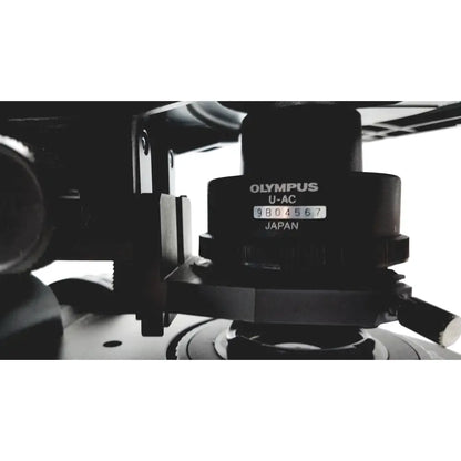 Black olympus u-ac camera tripod head with engraved serial number and japan marking on the olympus bx51tf microscope