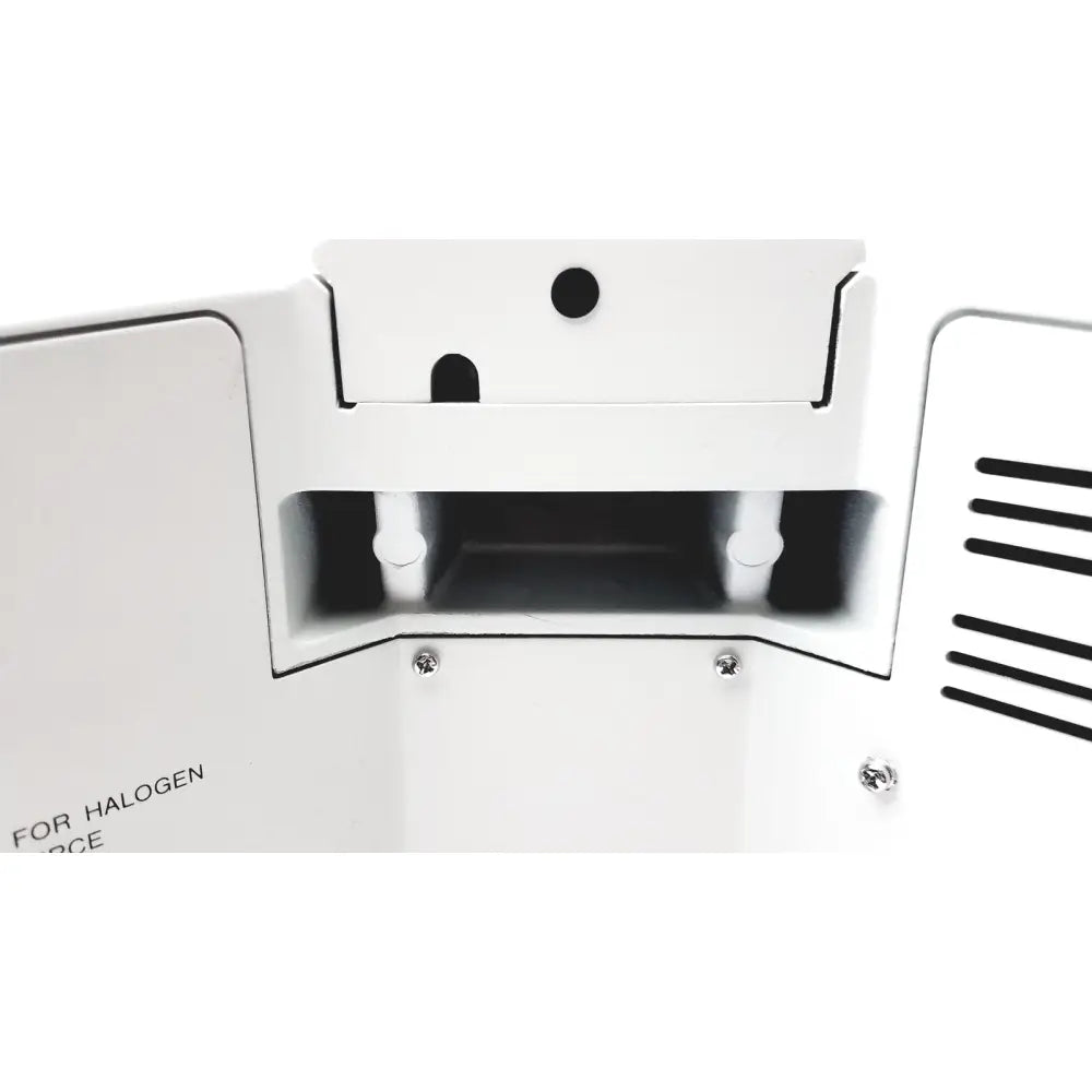 White plastic housing with black ventilation slats and mounting holes on the back of an olympus bx51tf microscope with body damage