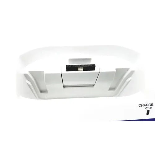 White plastic charging dock with black USB port and charge label for Olympus Capsule Recorder RE-10 cradle