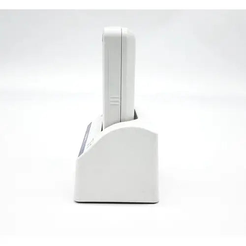 White wireless charging base with sleek minimalist design for olympus capsule recorder re-10 with maj-2032 cradle