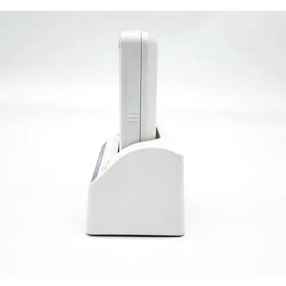 White wireless charging base with sleek minimalist design for olympus capsule recorder re-10 with maj-2032 cradle