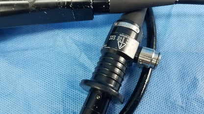 Black Olympus flexible fiber optic endoscope rhino-laryngoscope with metallic connector and textured grip for medical use