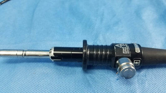 Black olympus endoscope rhino-laryngoscope fiberscope with metallic silver tip and textured grip fiber optic endoscope