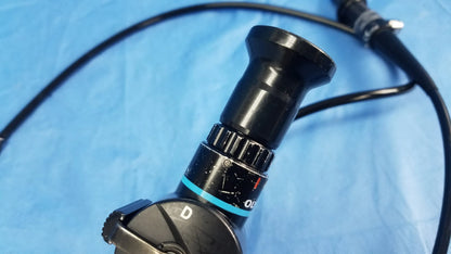 Olympus ENF-P4 rhino-laryngoscope black fiber optic endoscope with textured grip and blue accent ring for flexible use