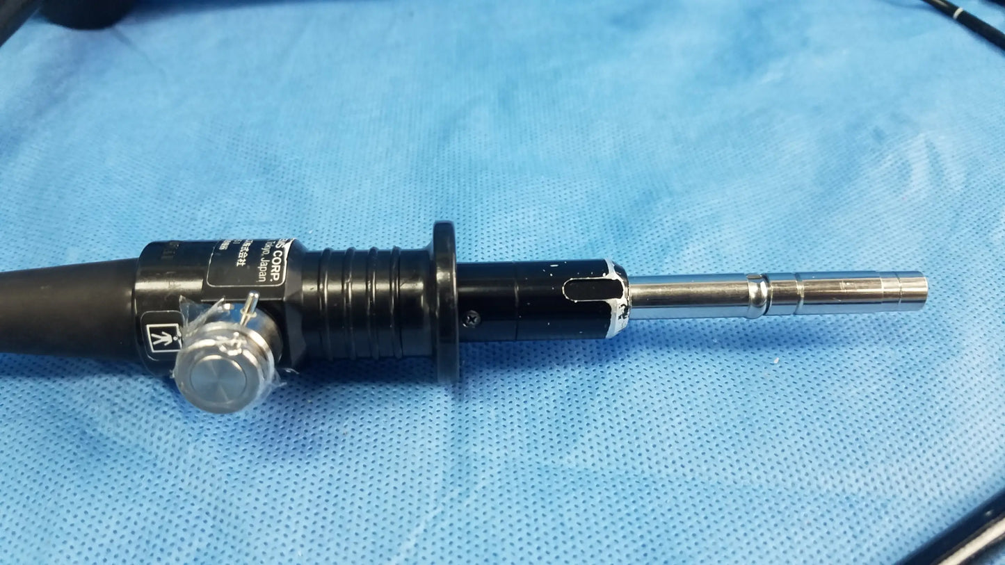 Black and silver Olympus fiber optic endoscope rhino-laryngoscope type ENF-P4 with textured grip and metallic tip