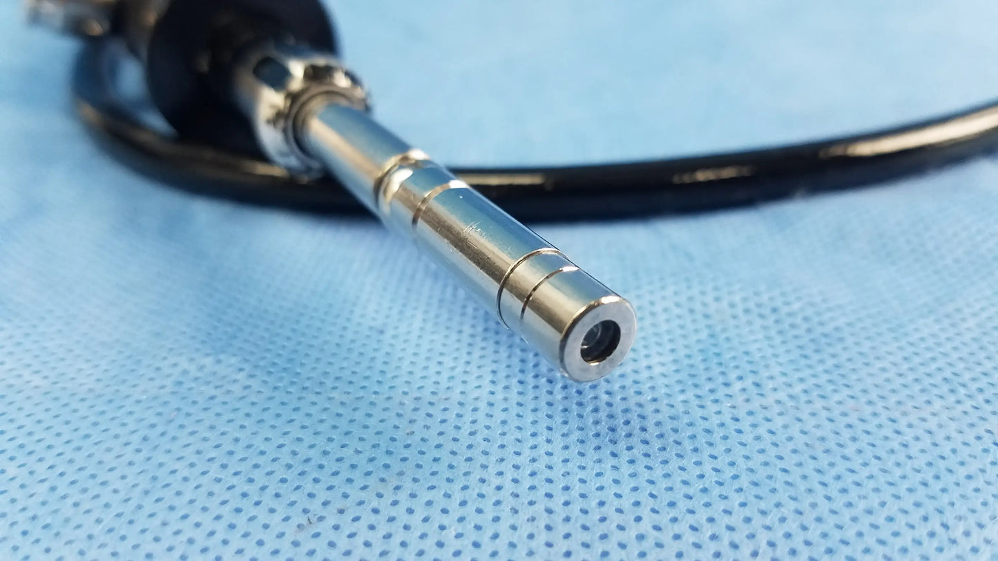 Silver metallic end of olympus fiber optic flexible endoscope rhino-laryngoscope type enf-p4 with black tubing