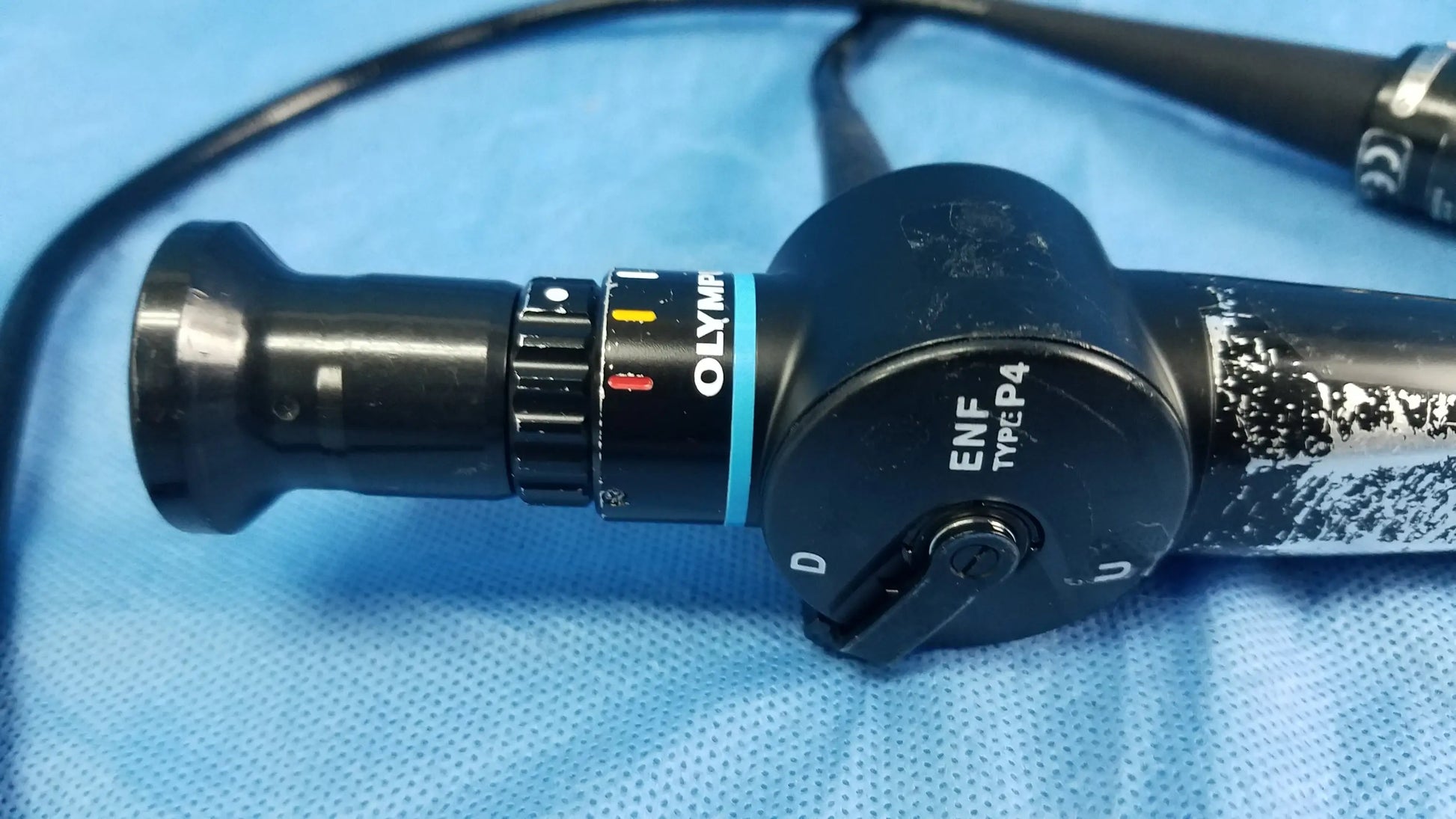 Black Olympus fiberscope endoscope rhino-laryngoscope ENF type P4 with flexible fiber optic and textured grip control dials