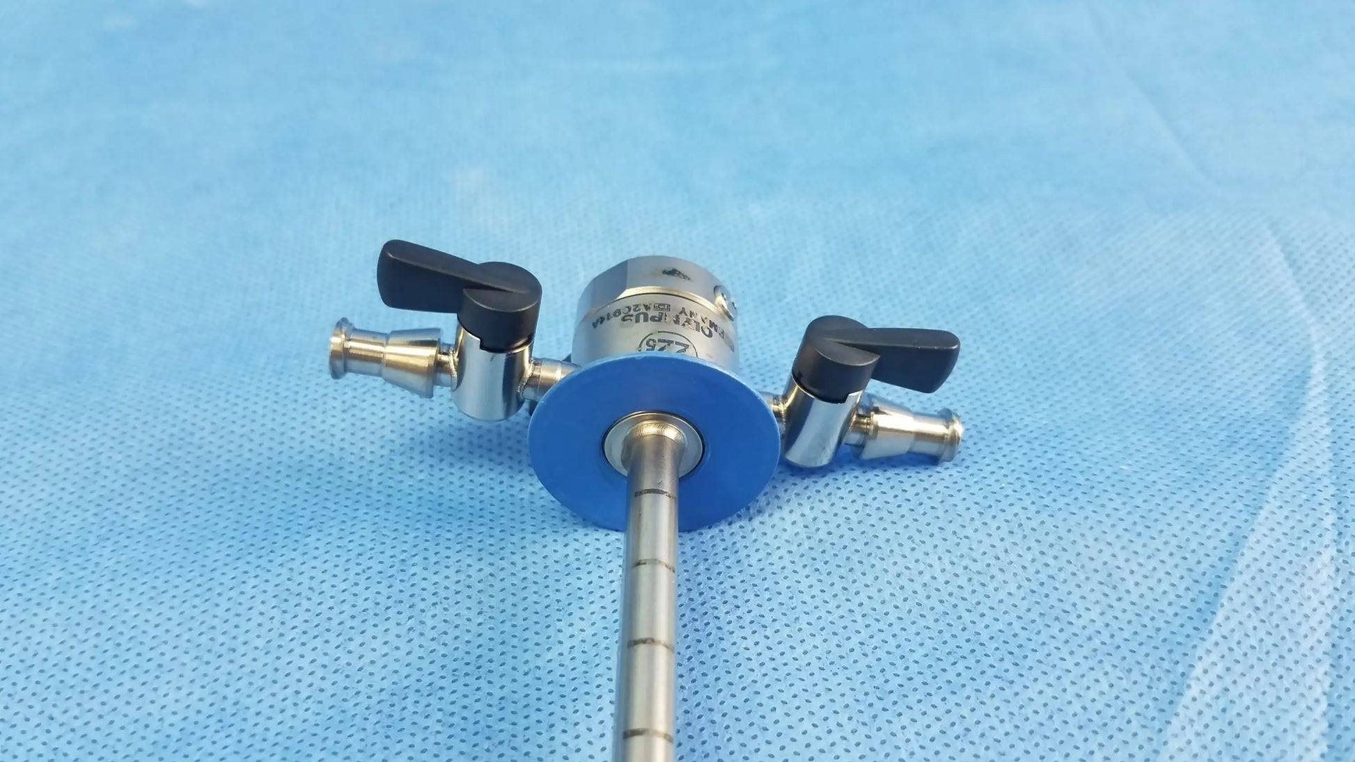 Olympus Germany a20914a cysto-urethroscope sheath with metallic body black handles and blue base endoscopic instrument component