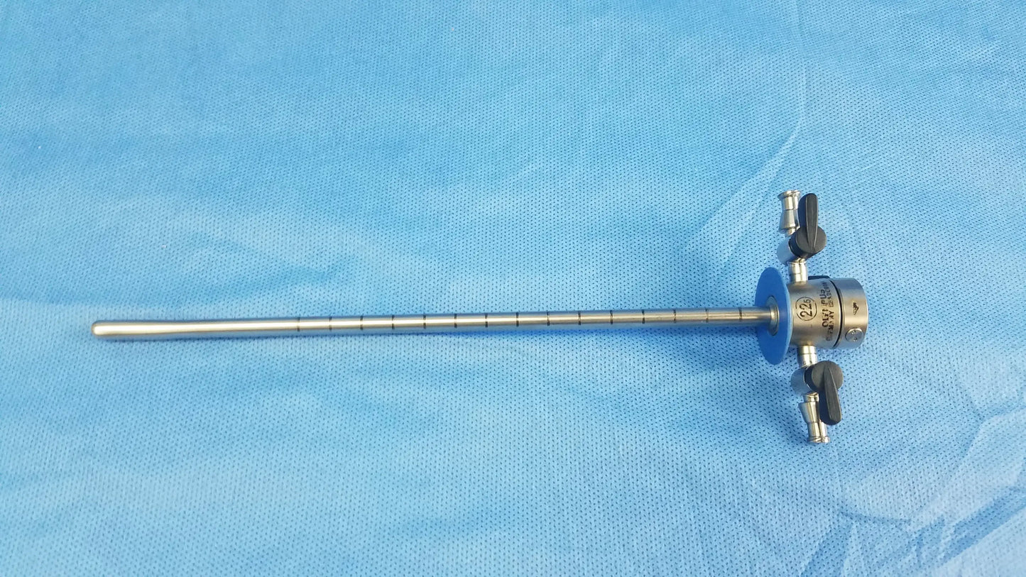 Silver metallic shaft surgical instrument component with blue circular handle and black knobs for cysto-urethroscope systems