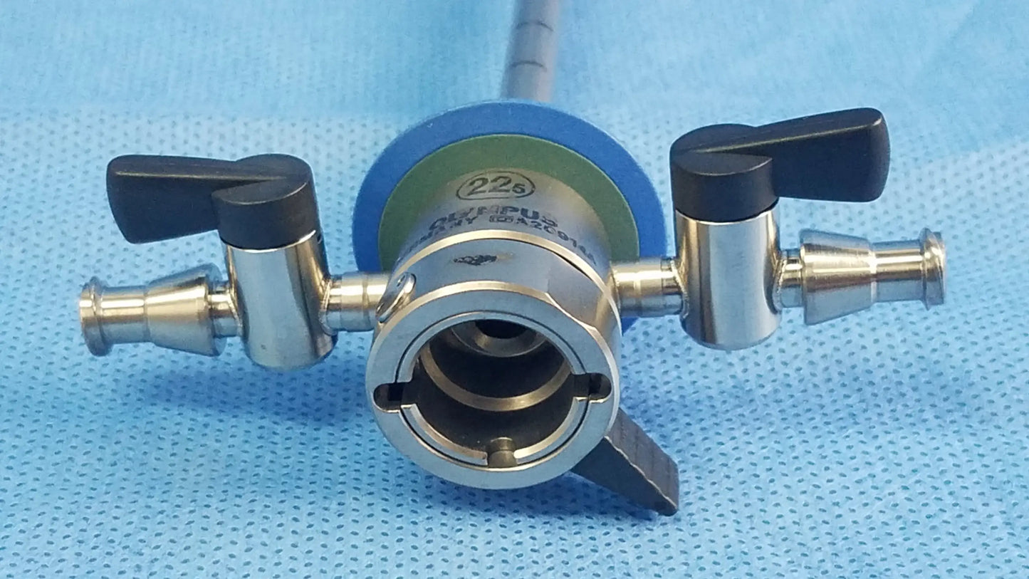 Silver surgical instrument component with black handles and blue circular part for cysto-urethroscope systems by Olympus Germany