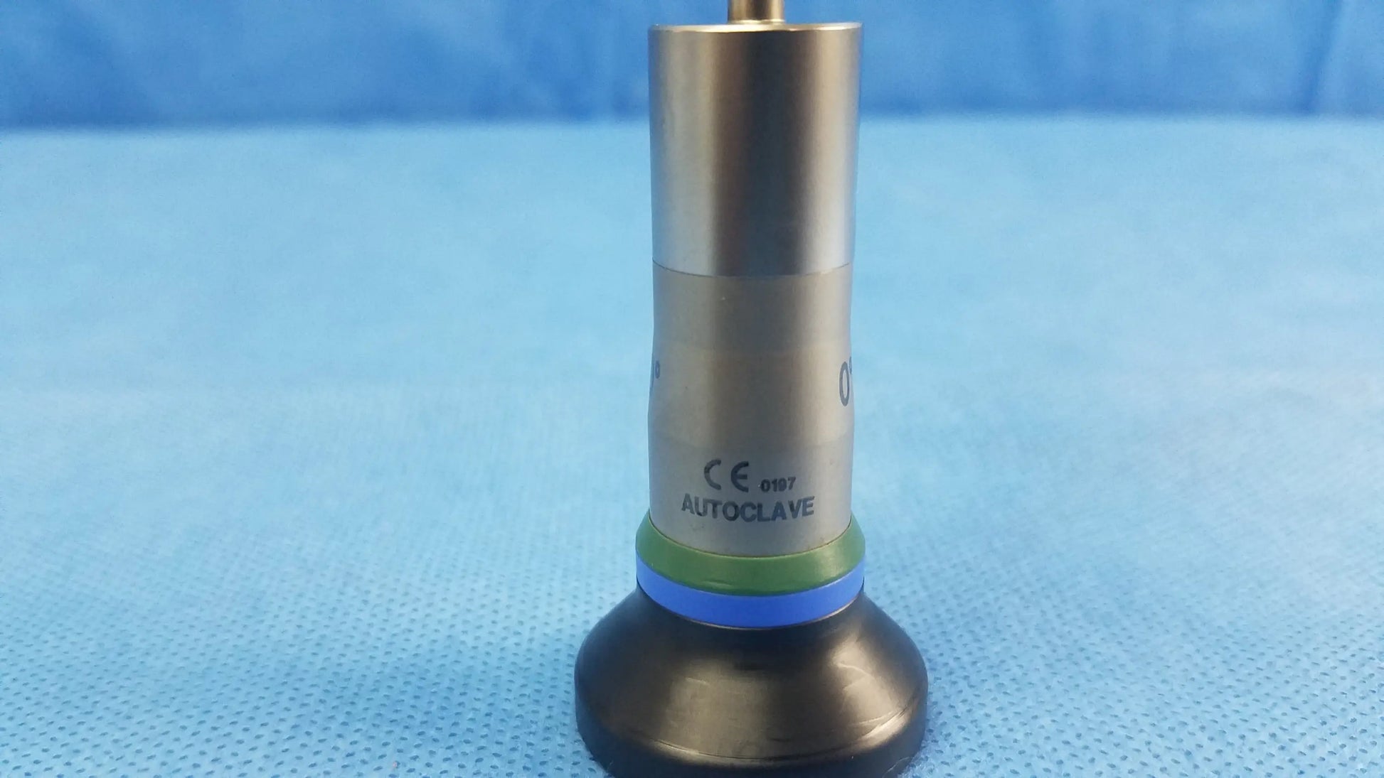 Silver cylindrical autoclave valve with black base and green-blue ring compatible olympus cystoscopic systems a22000a