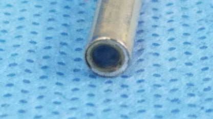 A metallic cylindrical a22000a autoclave cystoscope with hollow interior compatible with olympus cystoscopic systems
