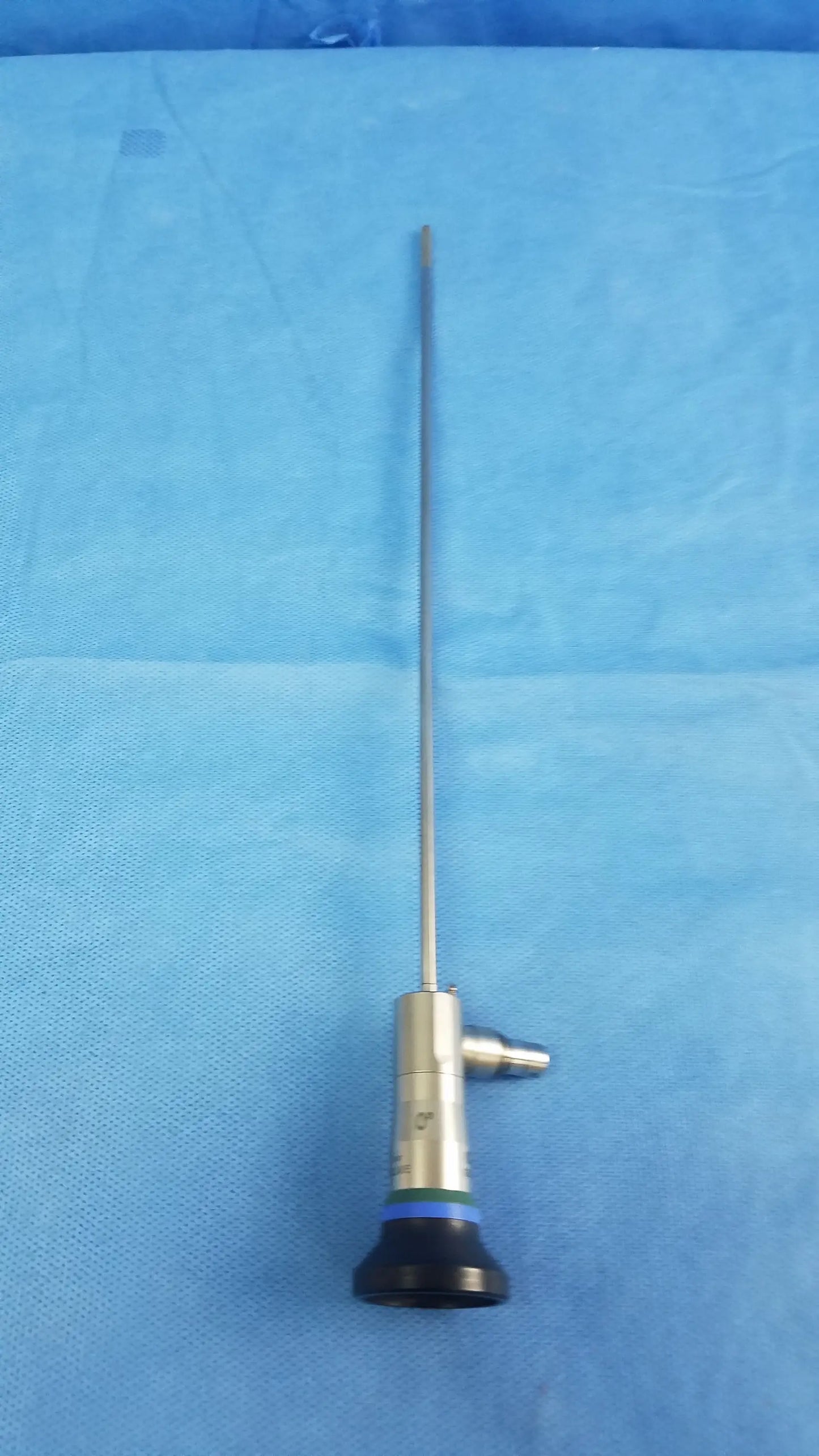Silver surgical endoscope with black rubberized base and metallic shaft compatible olympus cystoscopic a22000a system