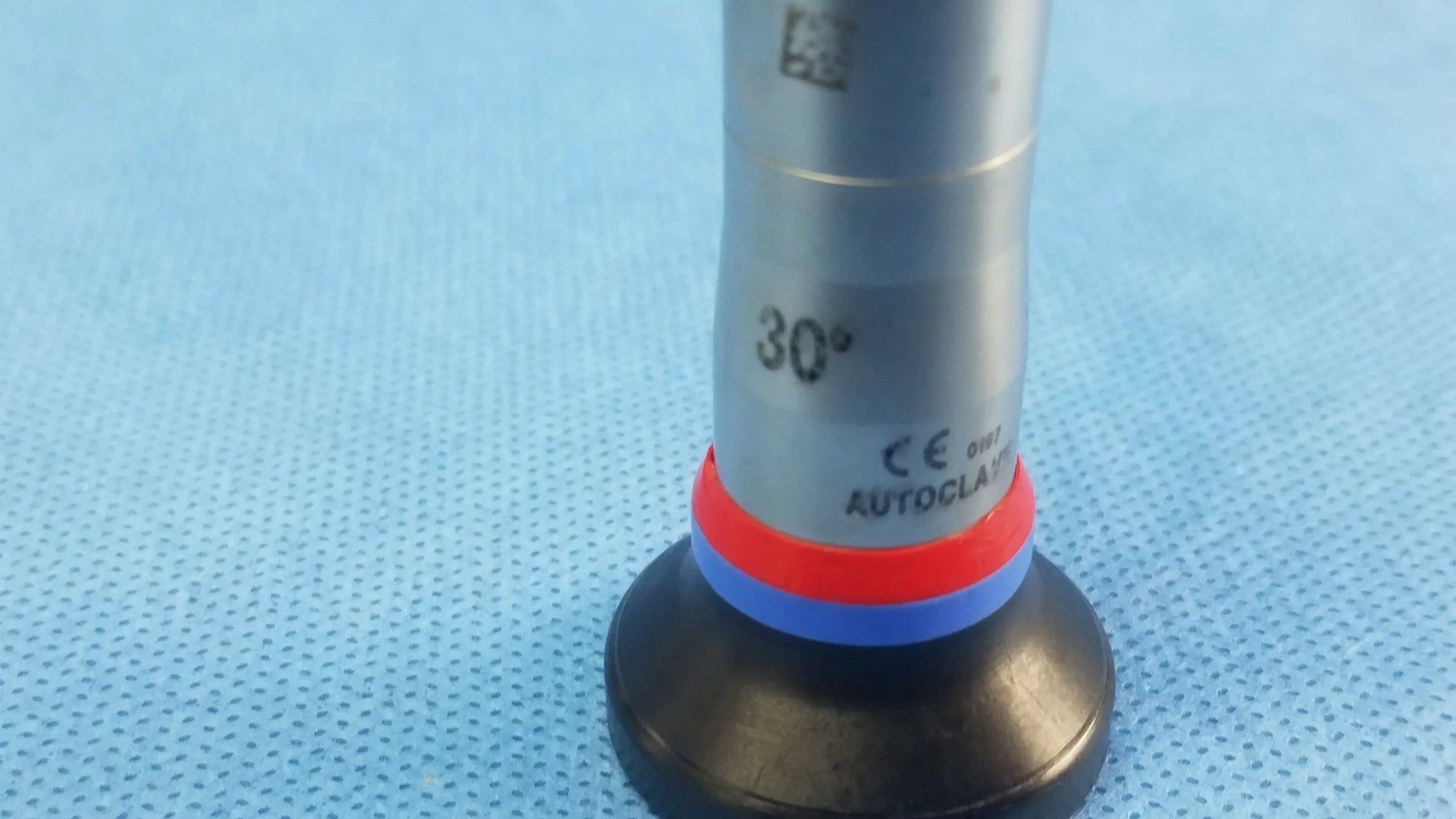 Silver surgical instrument with black base red-blue ring marked 30° autoclave compatible olympus cystoscopic a22002a