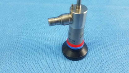 Silver metallic a22002a 30 degree autoclave compatible Olympus cystoscopic endoscope with black base and red and blue ring accents