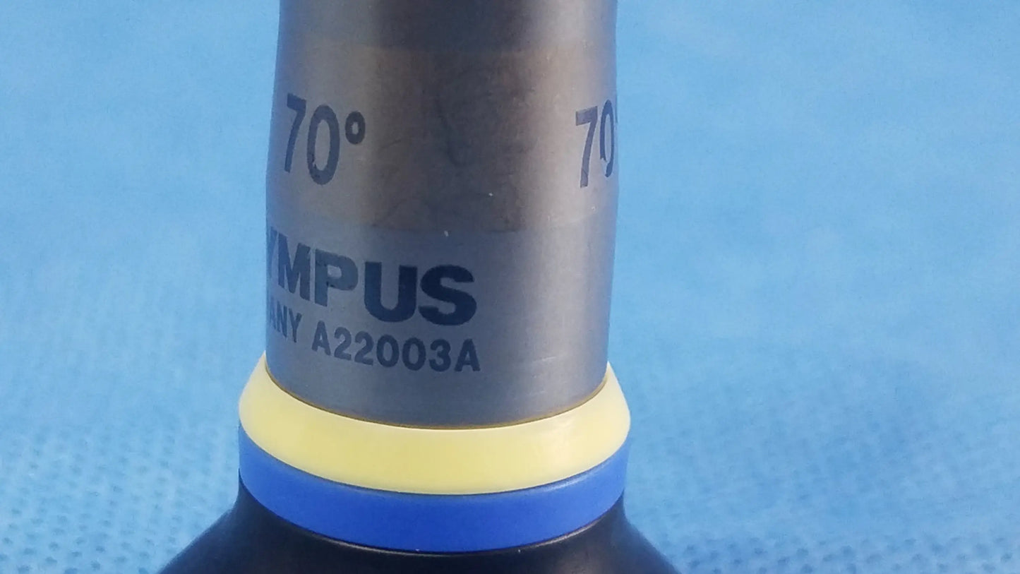 Silver olympus endoscopic rigid telescope a22003a with yellow and blue ring marked 70 degrees for medical use