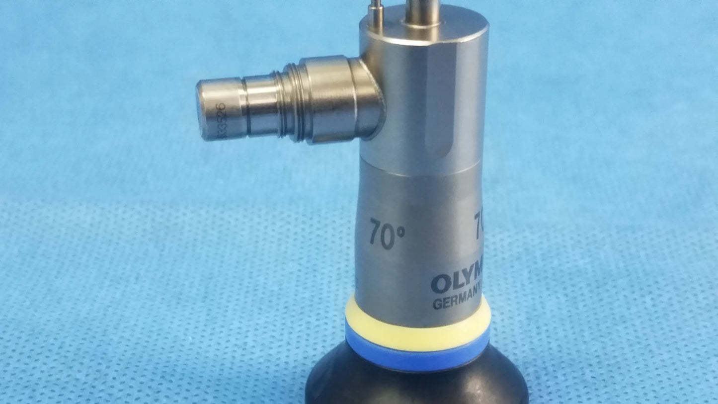 Silver metallic olympus endoscopic a22003a rigid telescope with black rubber base and yellow-blue ring on cylindrical body