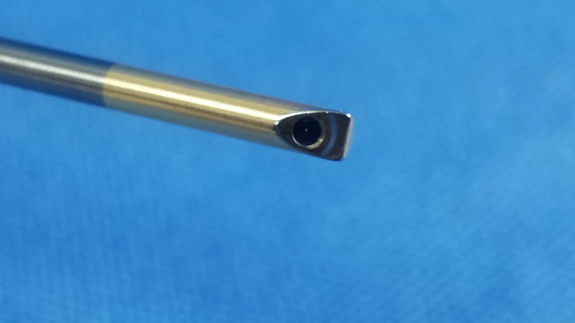 A precision-engineered gold metallic drill bit with sharp tip for olympus germany a22003a 70° rigid telescope compatible olympus endoscopic systems