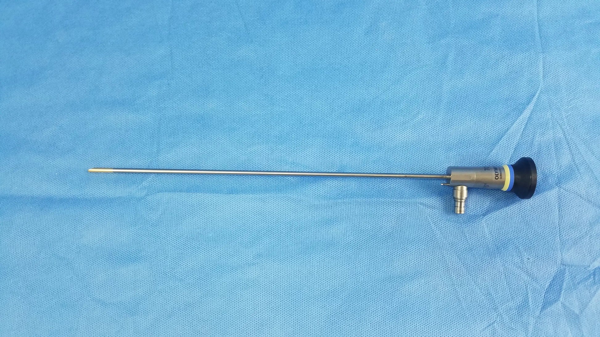 Silver rigid telescope with black and yellow capped tip compatible olympus endoscopic systems for precise surgical use