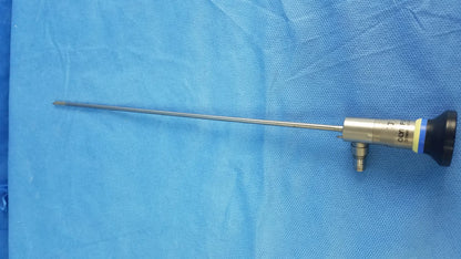 Silver surgical rigid telescope with black and yellow handle and metallic shaft compatible with Olympus endoscopic systems