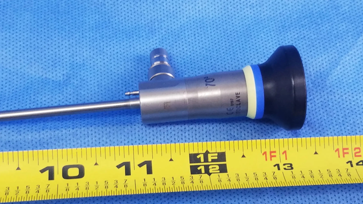 Silver rigid telescope with black rubber tip and blue accent ring marked 70 compatible olympus endoscopic systems