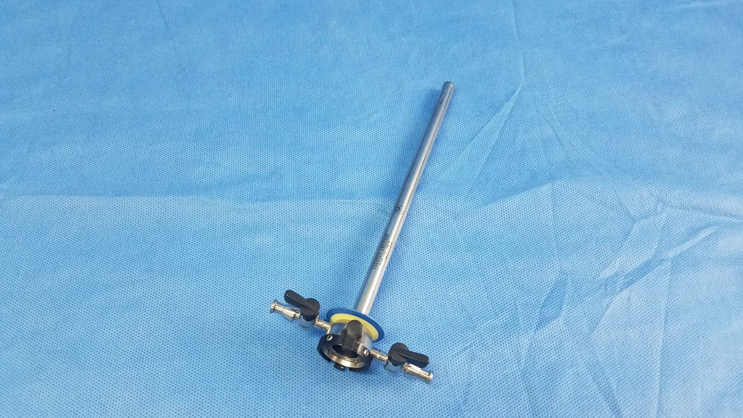 Silver continuous-flow outer resectoscope sheath with long slender shaft and black-handled knobs by Olympus Germany