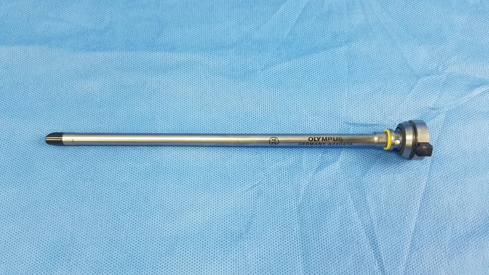 Silver metallic olympus germany a22041a hysteroscopic inner sheath with sleek cylindrical body and black-tipped end instrument component