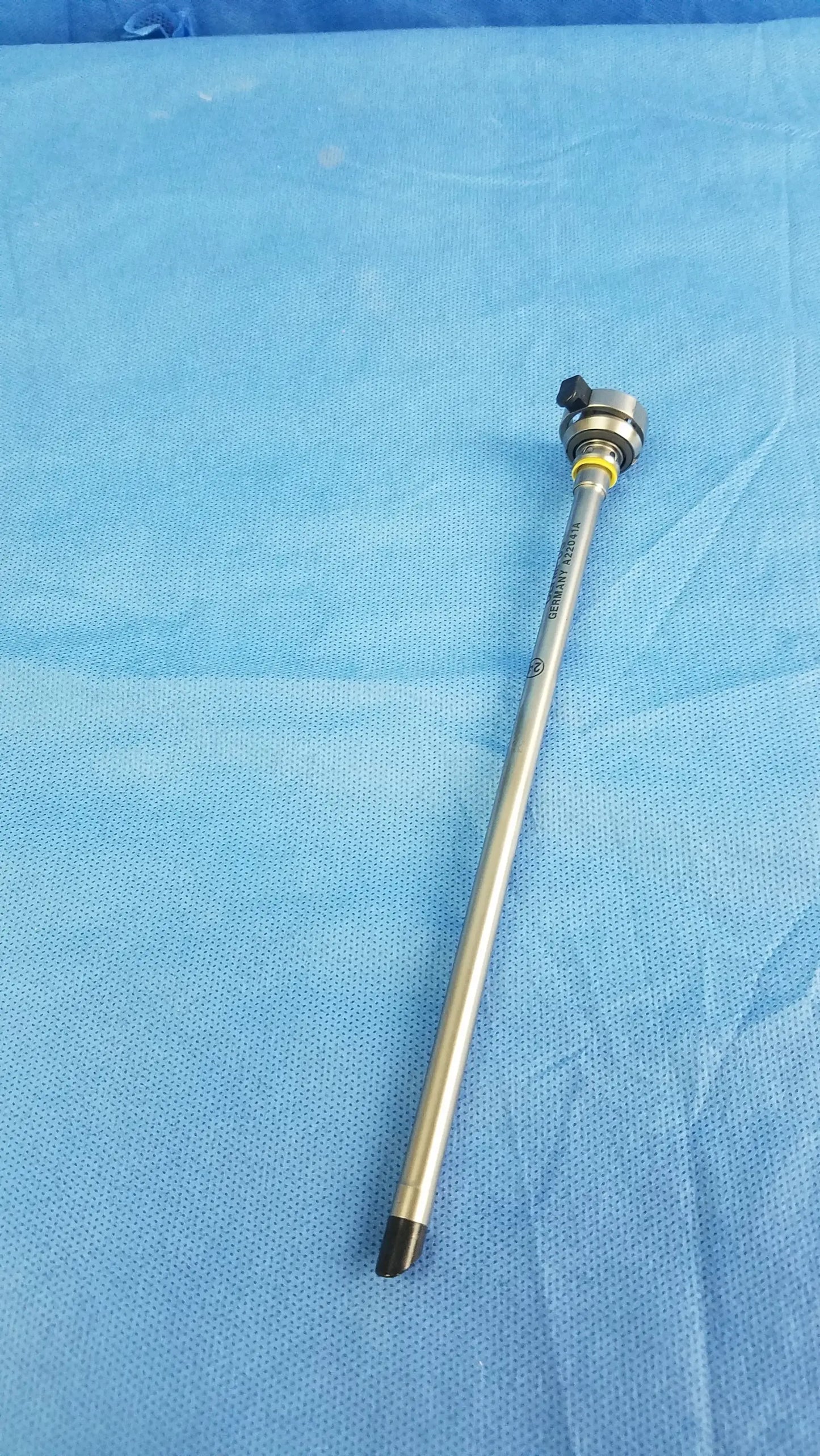 Silver Olympus Germany A22041A hysteroscopic inner sheath with black tip yellow ring and engraved text endoscopic instrument component
