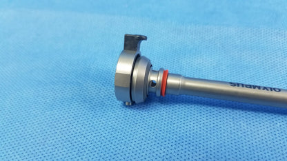 Silver-colored olympus germany a22042a 26fr resection sheath with metallic shaft and orange o-ring instrument component