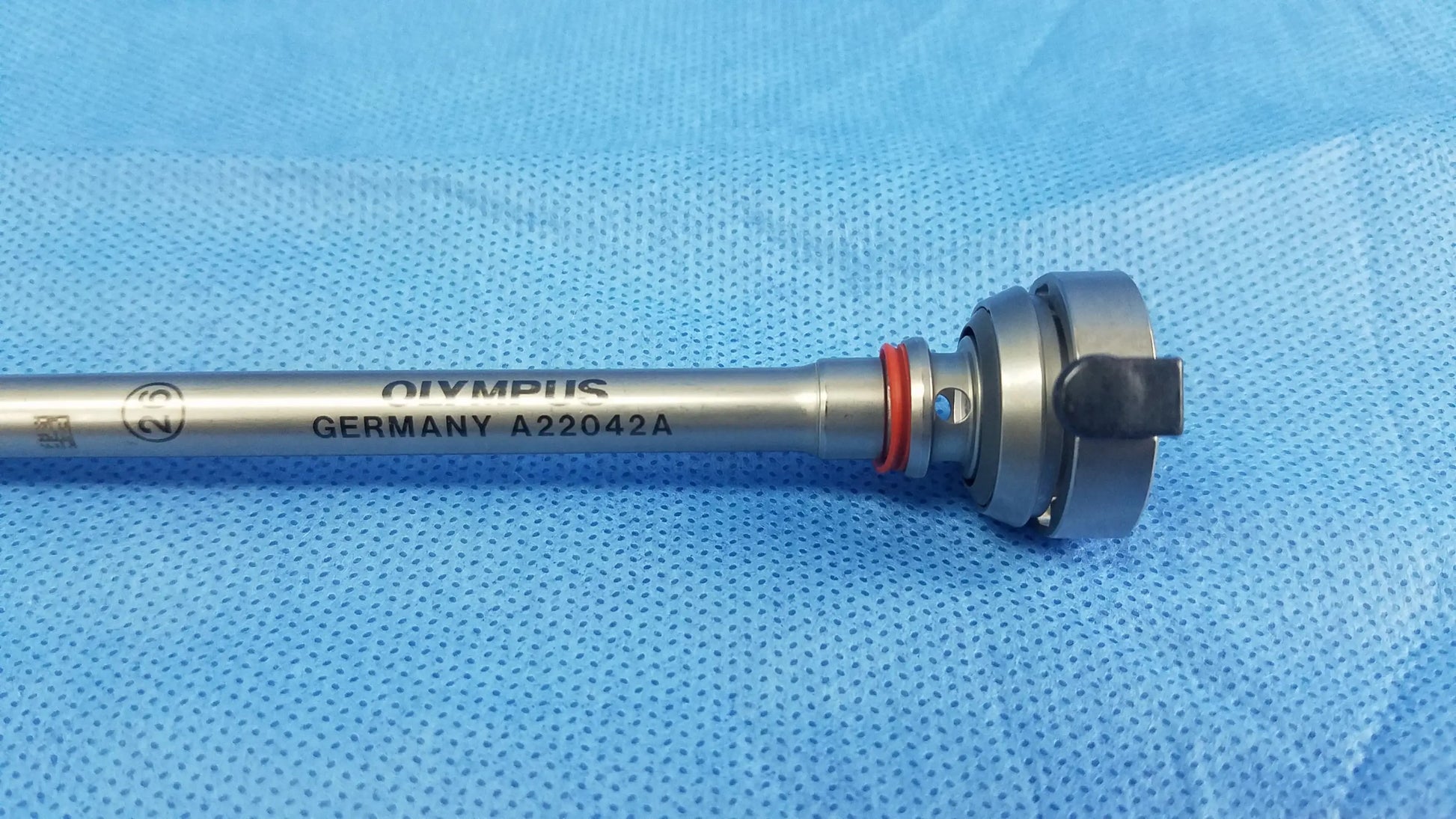 Silver metallic olympus germany a22042a 26fr resection sheath with black handle and orange o-ring instrument component