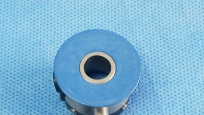 Blue irrigation port with metallic inner ring and screws compatible with Olympus endoscopic instrument component