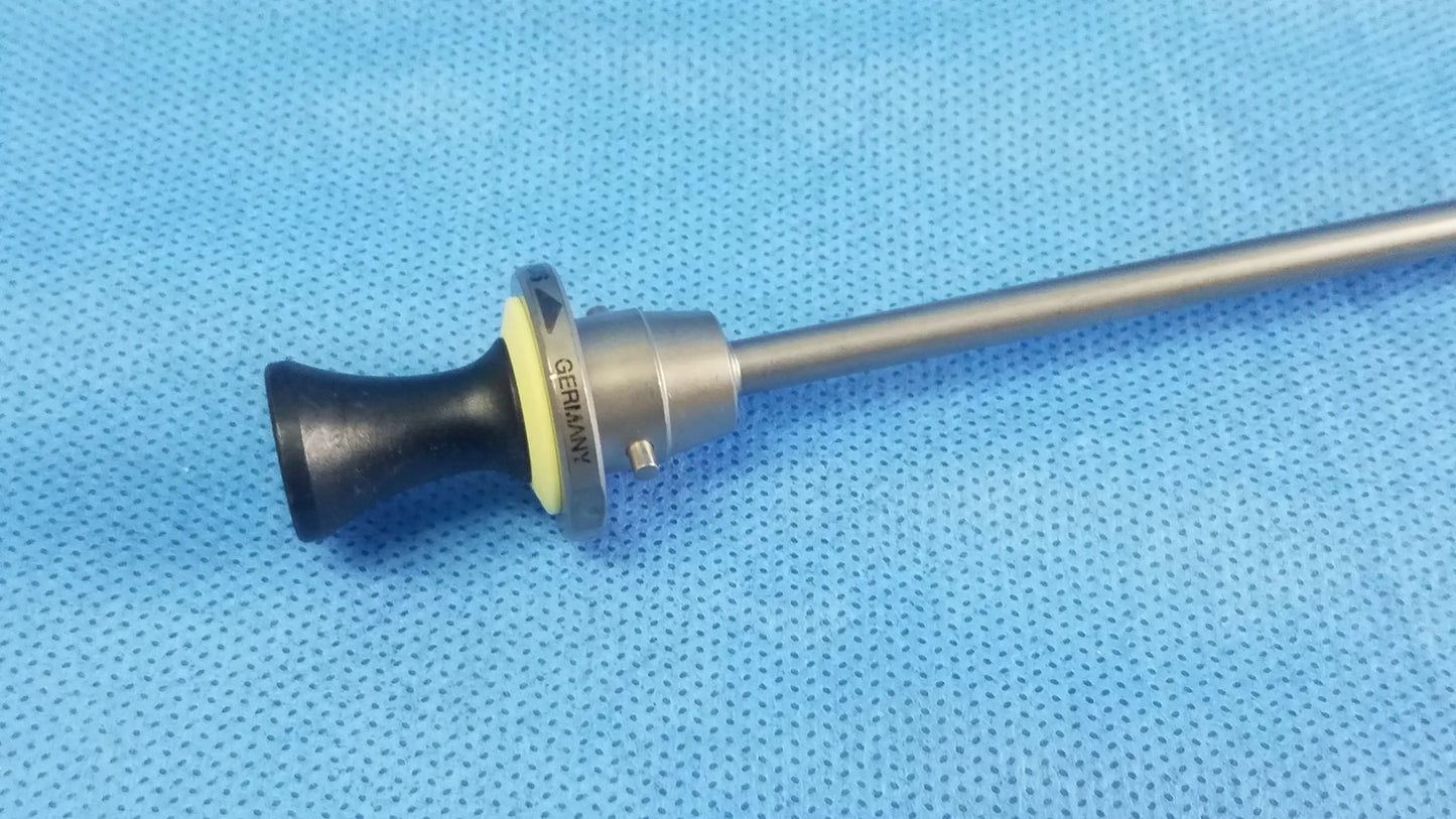 Silver surgical endoscope with black tapered handle and yellow accent ring compatible olympus standard obturator instrument component