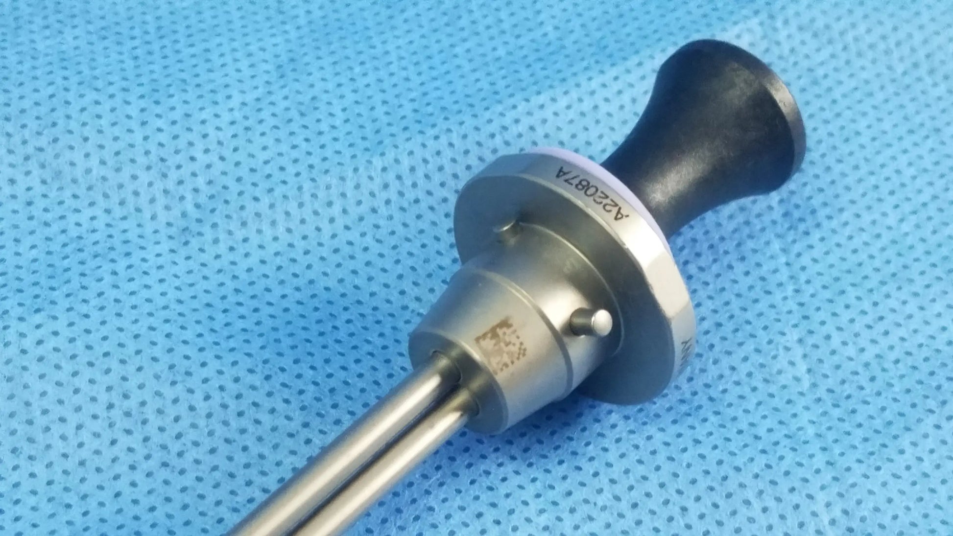 Olympus Germany A22087A medical endoscope with black ergonomic handle and silver metallic shaft featuring obturator deflecting tip