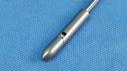 Silver surgical instrument with a sleek cylindrical body and pointed obturator deflecting tip by olympus germany
