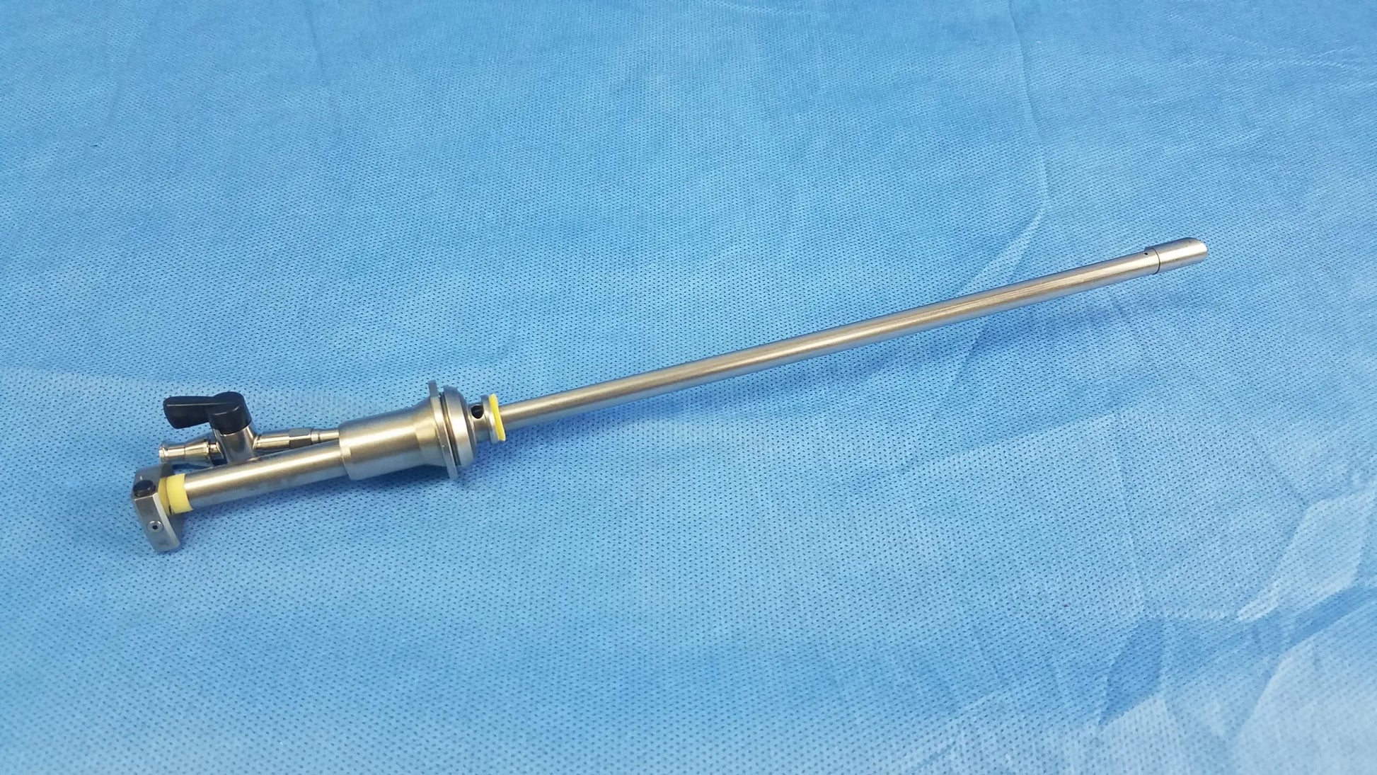 Stainless steel working insert a42091a with long slender shaft and black handles in richard wolf hystero-resectoscope tray